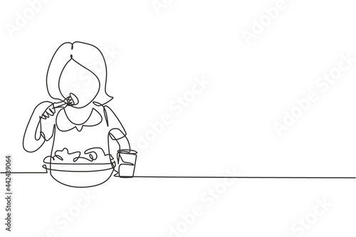 Single one line drawing girl having salad meal with fork around table. Happy and enjoy breakfast in morning. Delicious and healthy food. Modern continuous line draw design graphic vector illustration