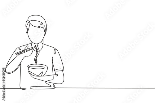 Single one line drawing young male having noodles meal with chopsticks around table. Enjoy lunch when hungry. Delicious and healthy food. Modern continuous line draw design graphic vector illustration