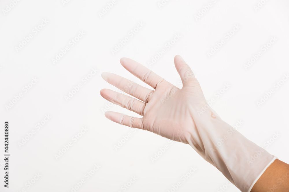 Woman wearing hand to blue rubber medical glove