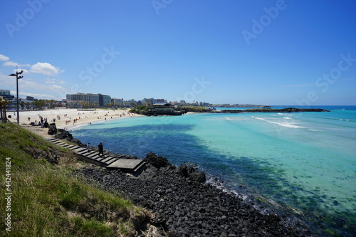 a beautiful seaside landscape with clear water  scenery around hamdeok beach