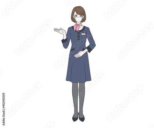 マスクをつけて案内をする受付嬢