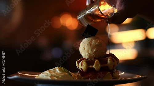 People used caramel cream to ice cream on waffle bake photo