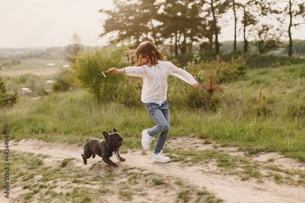 Portrait of a little girl with her beautiful dog