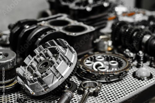 spare parts were placed on a metal table.