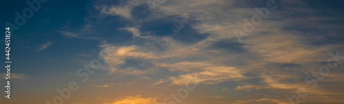Dark Blue Sunset , red, orange, yellow color cloudy sky panorama background  © milen69