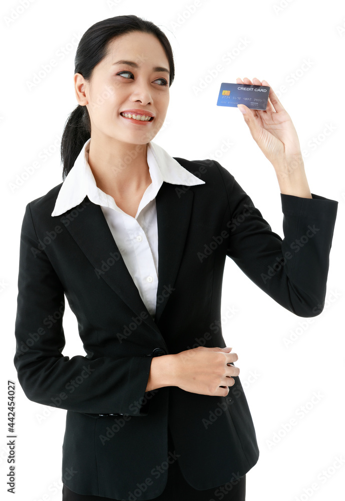 Portrait closeup isolated cut out shot of Asian happy beautiful friendly successful female businesswoman wears black formal suit standing hold blue credit card in hand in front of white background Portrait closeup isolated cut out shot of Asian happy beautiful friendly successful female businesswoman wears black formal suit standing hold blue credit card in hand in front of white background