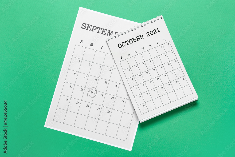 Flip paper calendars on color background Flip paper calendars on color background