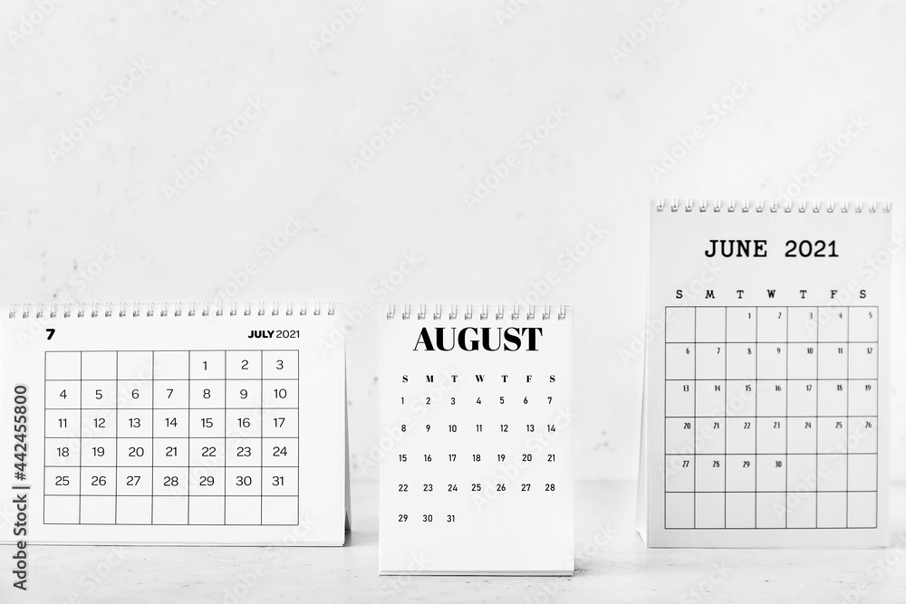 Flip paper calendars on light background Flip paper calendars on light background