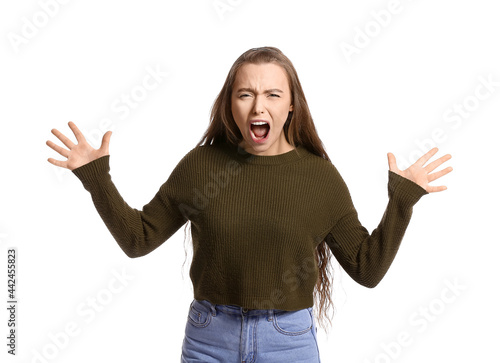 Angry young woman on white ...