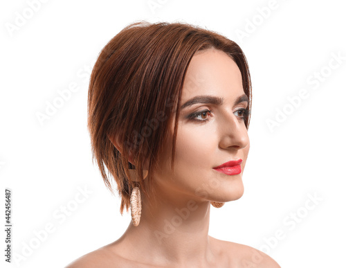 Beautiful young woman on white background