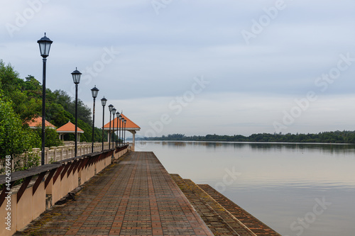 Fototapeta Naklejka Na Ścianę i Meble -  A public park where ferries are transported. Beautiful scenery when the sky is dark and the rain is almost falling