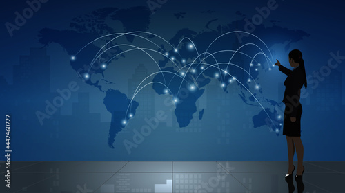 Businesswoman stands showing and touching communicated network on world map.