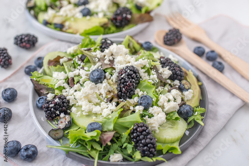 healthy summer salad with berries and feta cheese