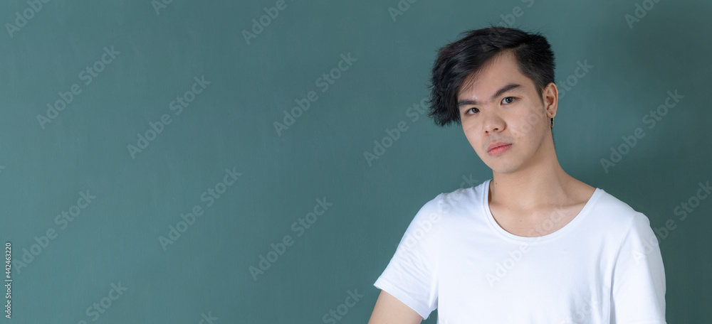 Content Asian man in casual style in studio Content Asian man in casual style in studio