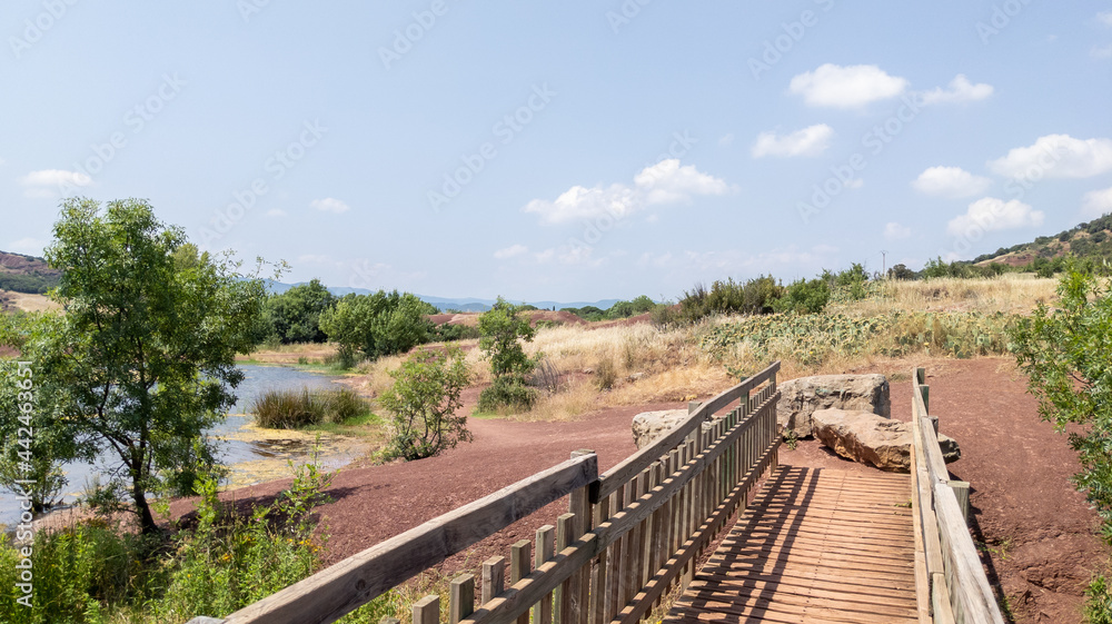 wooden bridge entrance lake lac du Salagou in France