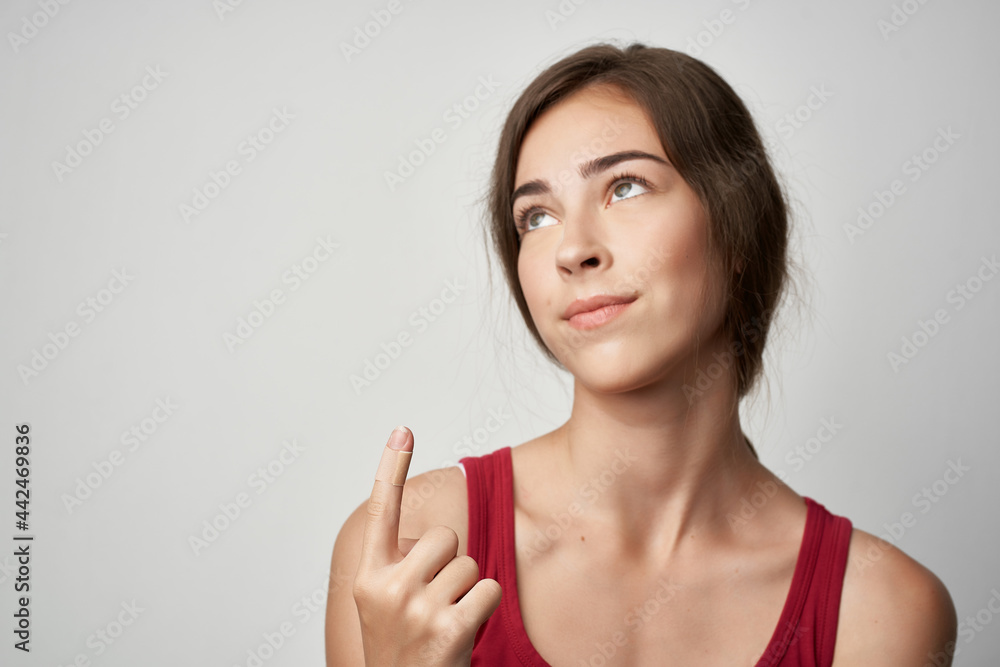 woman showing index finger injury health problems close-up woman showing index finger injury health problems close-up