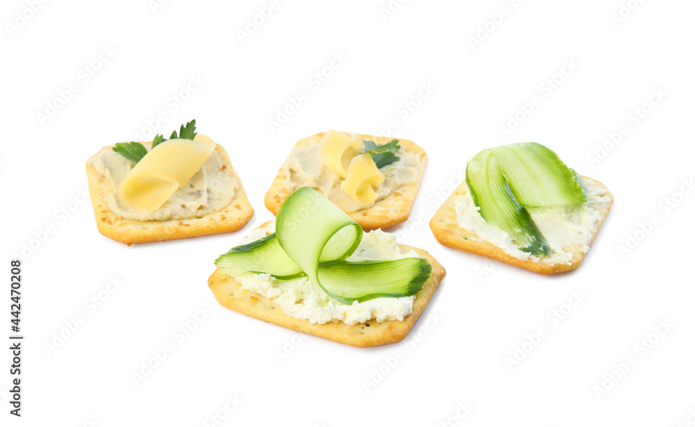 Delicious crackers with humus and cheese on white background Delicious crackers with humus and cheese on white background