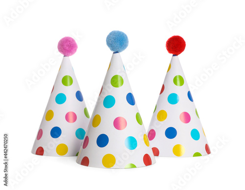 Bright birthday party hats on white background © New Africa