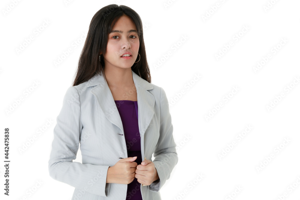 Confident Asian female wearing trendy jacket looking at camera on white background in studio Confident Asian female wearing trendy jacket looking at camera on white background in studio