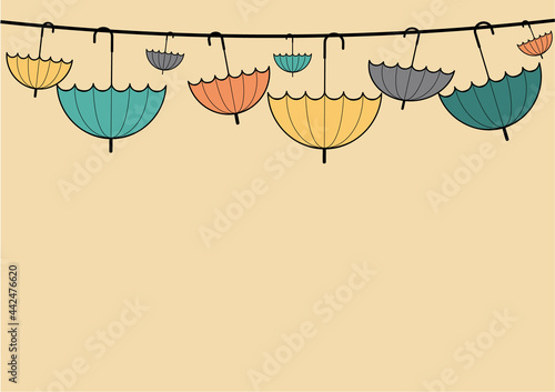 Template with umbrellas hanging on the line, fitted to horisontal A4 card. Different sizes umbrella frame in autumn colours- orange, green, yellow. Autumn background