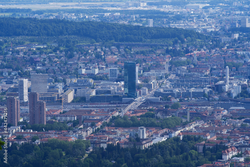 Panoramic view over City of Zurich seen from local mountain Uetliberg on a summer day. Photo taken June 29th, 2021, Zurich, Switzerland.