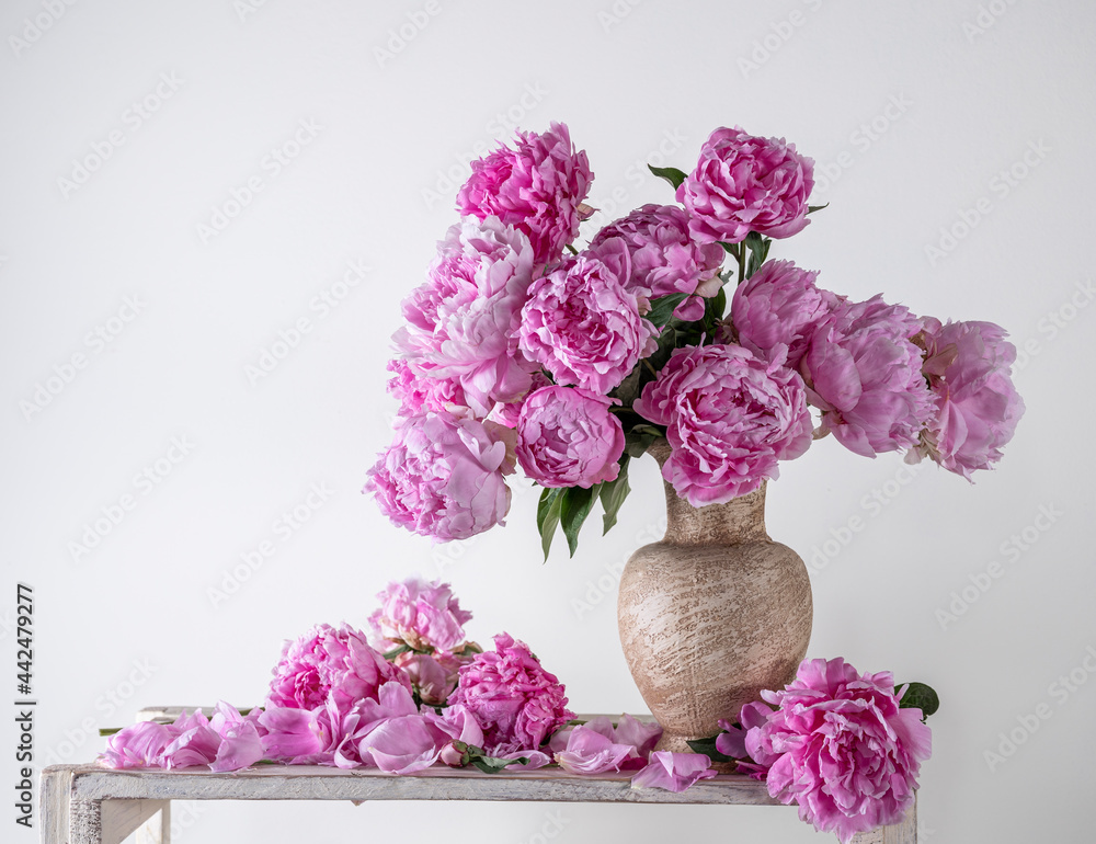 Beautiful bouquet of pink peonies in vase