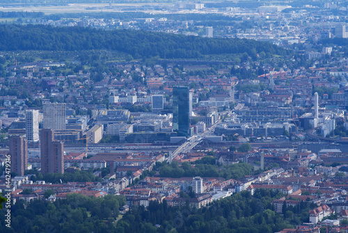 Panoramic view over City of Zurich seen from local mountain Uetliberg on a summer day. Photo taken June 29th, 2021, Zurich, Switzerland. © Michael Derrer Fuchs