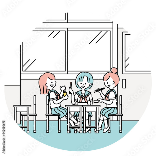 昼休みに教室でお弁当を食べる女子生徒たち