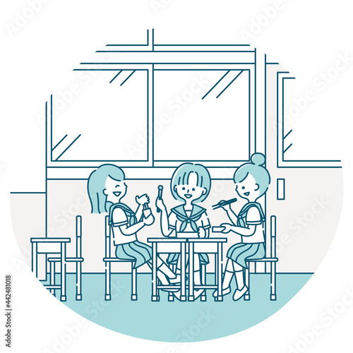 昼休みに教室でお弁当を食べる女子生徒たち