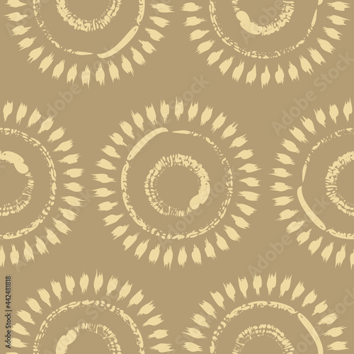 Vector drawn yellow suns ocher seamless pattern