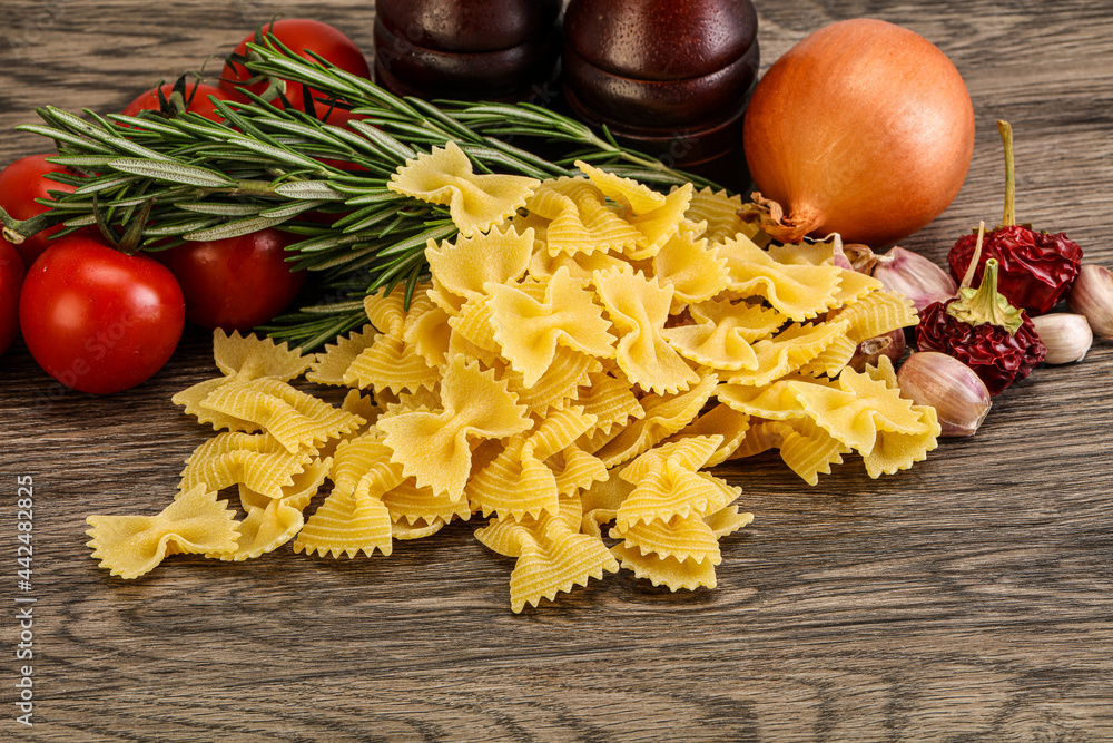 Raw Italian farfalle pasta for cooking Raw Italian farfalle pasta for cooking