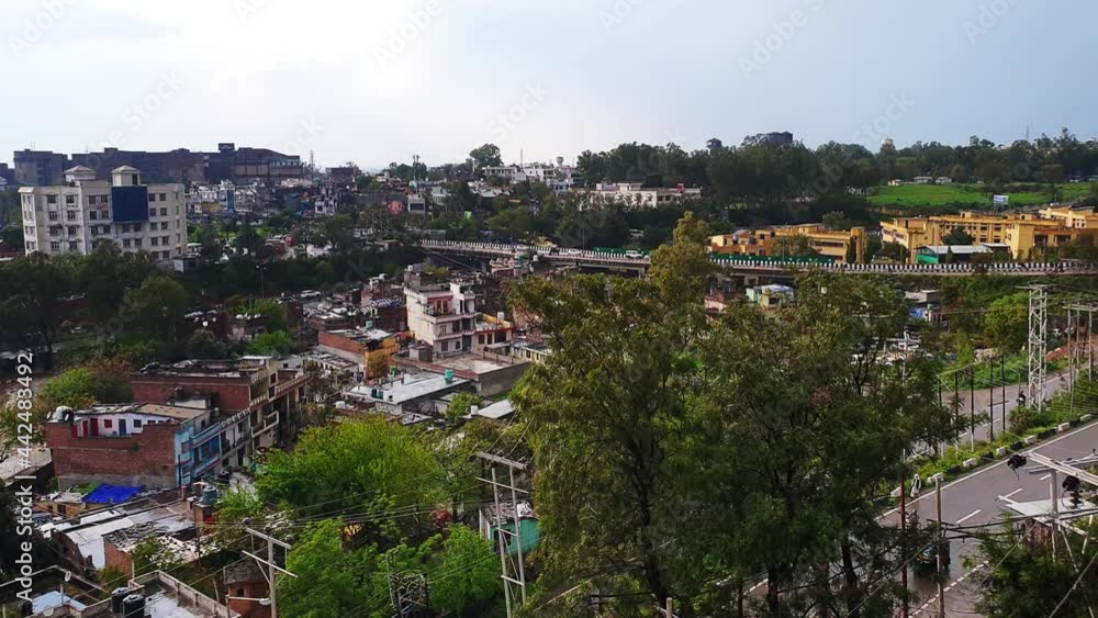 City Architecture beautiful building cloudy blue sky flying birds in background in a small city City Architecture beautiful building cloudy blue sky flying birds in background in a small city