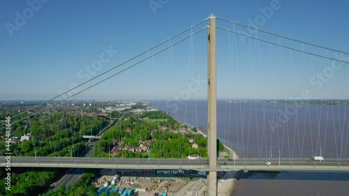 Aerial trucking shot - Humber bridge over the the Estuary Near Kingston Upon Hull photo