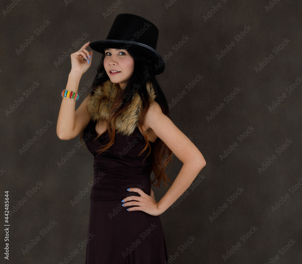 Joyful fancy woman in black dress and hat Joyful fancy woman in black dress and hat