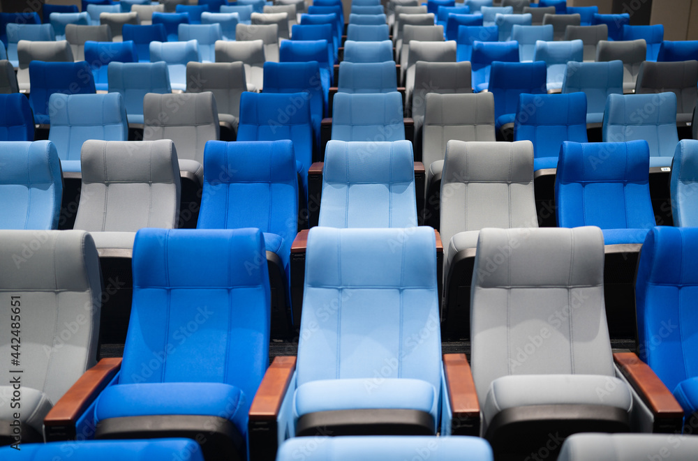 conference room with many blue and gray seats. conference room with many blue and gray seats.