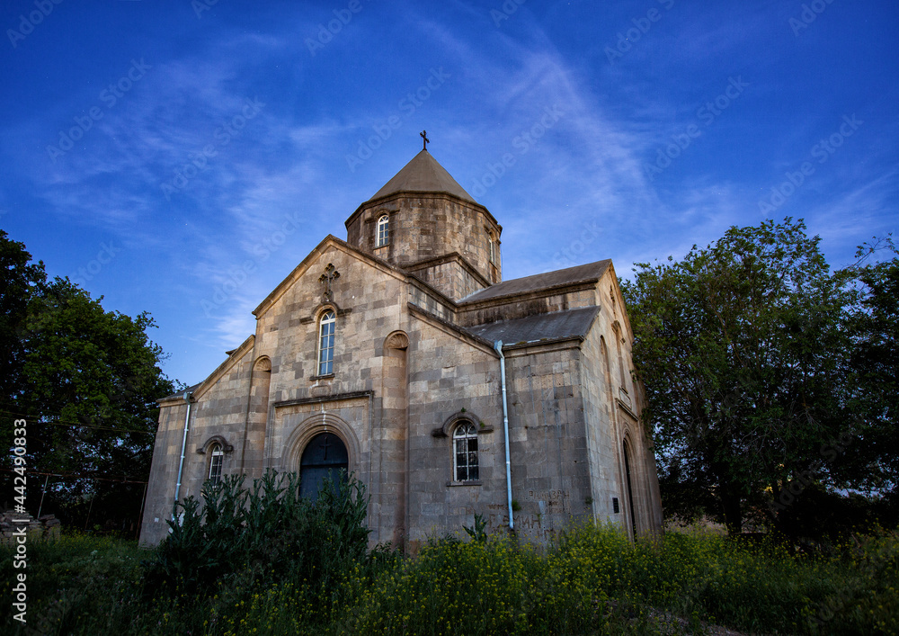 Fototapeta premium Church of St. Grigoris in Nyugdi - Armenian church in Dagestan in the evening