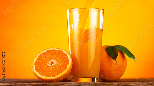Fresh Orange Juice Being Po...