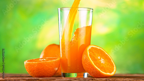 Fresh Orange Juice Being Po...