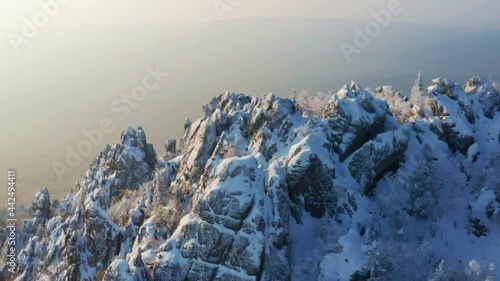 Wallpaper Mural Snow-capped mountain ranges covered with coniferous forest. Taganay National Park in Russia. Aerial view Torontodigital.ca