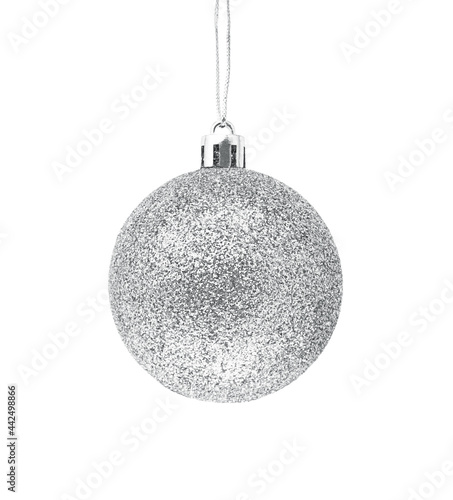 Hanging silver glitter Christmas bauble isolated on white background.