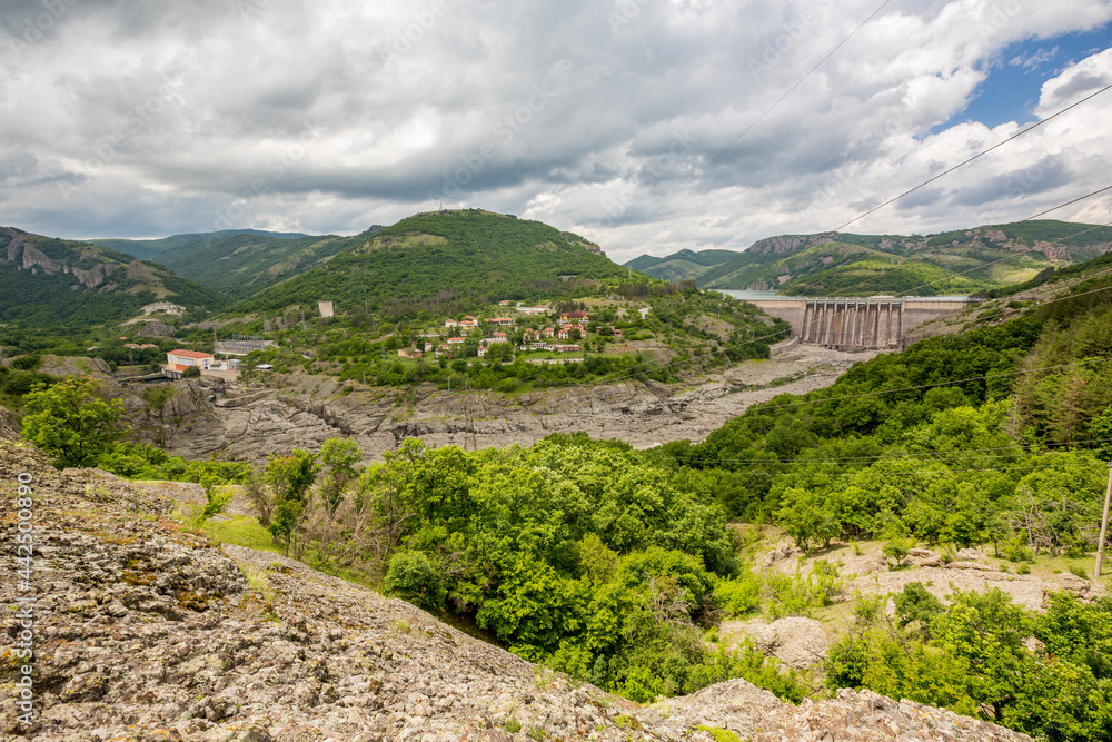 Studen Kladenets water dam wall panoramic view, scenery cloudy sky, Southern Bulgaria