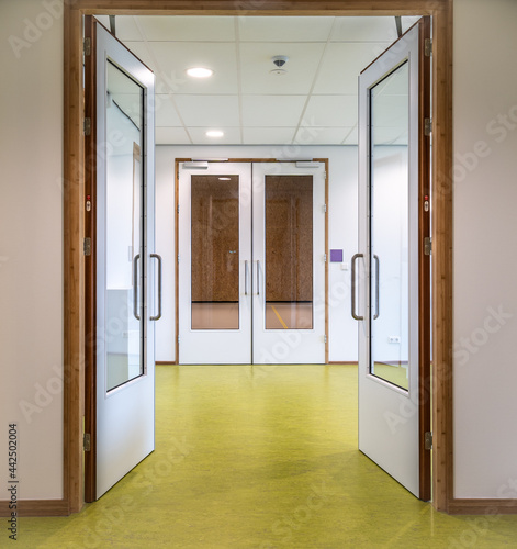 Fire-resistant swing doors in a corridor photo