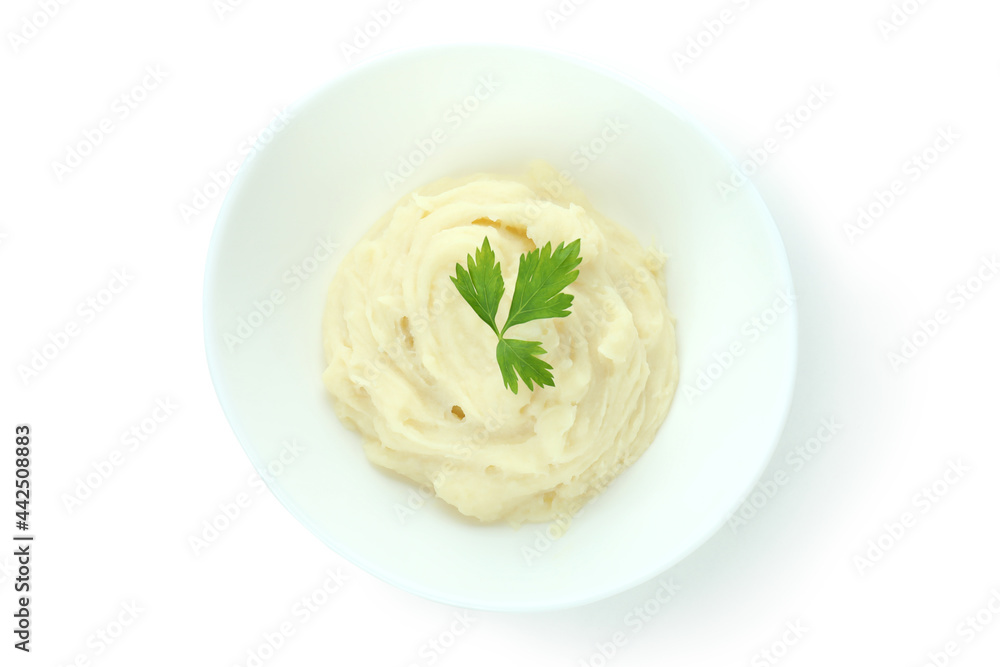 Plate of mashed potatoes isolated on white background