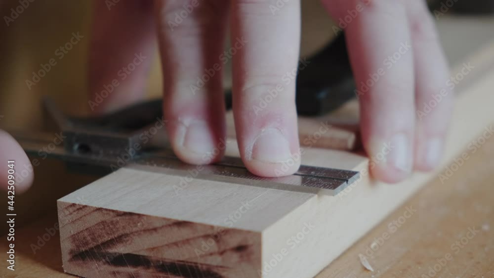 Joiner makes a mark with a knife Making handmade furniture Joiner makes a mark with a knife Making handmade furniture