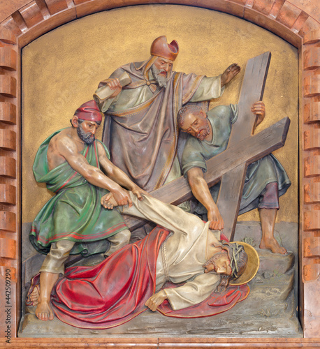 VIENNA, AUSTIRA - JUNI 18, 2021: The relief of Jesus fall under the cross in the Herz Jesu church from begin of 20. cent. by Workroom from Munich. photo