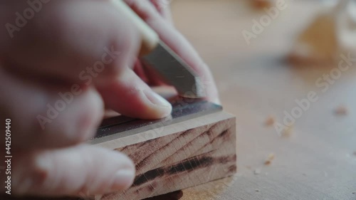 Joiner makes a mark with a knife Making handmade furniture