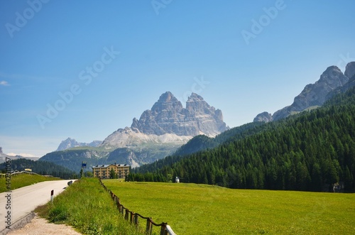 road towards Misurina and in the background the tre cime Lavaredo. fantastic landscape in the dolomites italy. hiking