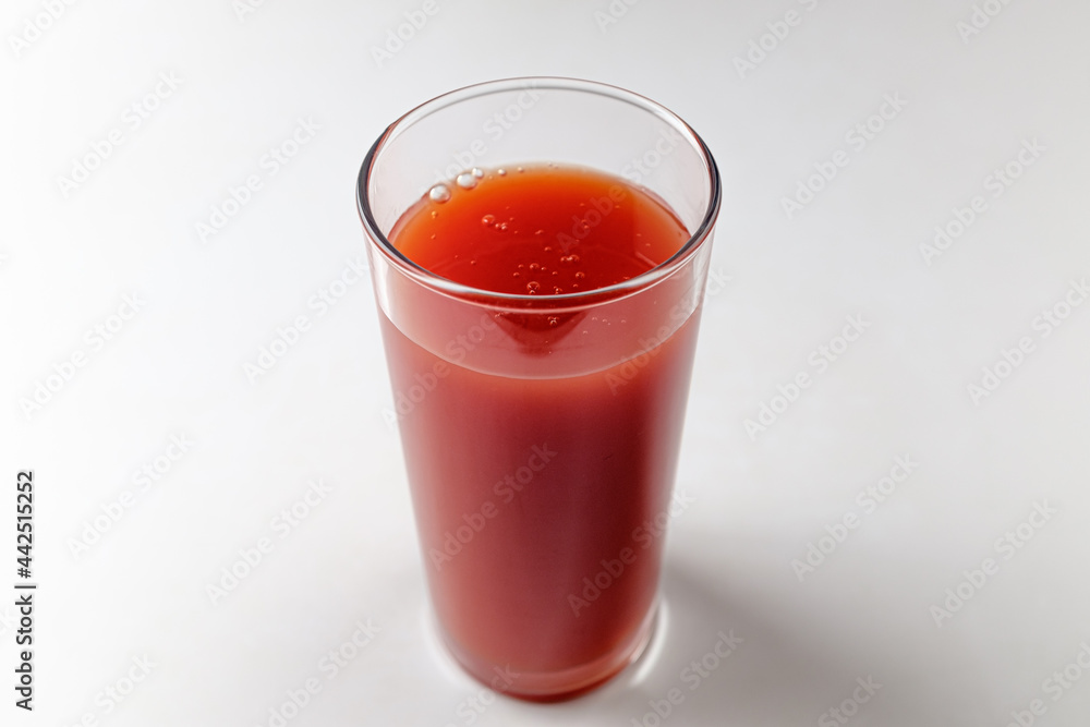 tomato juice on a white background tomato juice on a white background