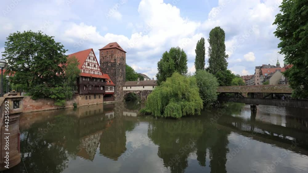 Nuremberg, Germany, beautiful old bridge with medieval tower and half timbered house. Nuremberg, Germany, beautiful old bridge with medieval tower and half timbered house.