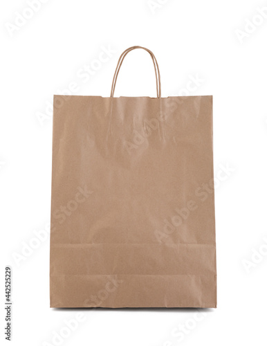 Shopping recycled brown paper bag isolated on white background with clipping path